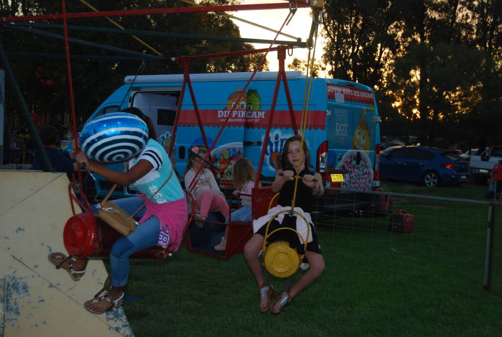 RIDING ALONG: Loads of fun was had at the Nyngan Public School Fete.Photo: GRACE RYAN. 
