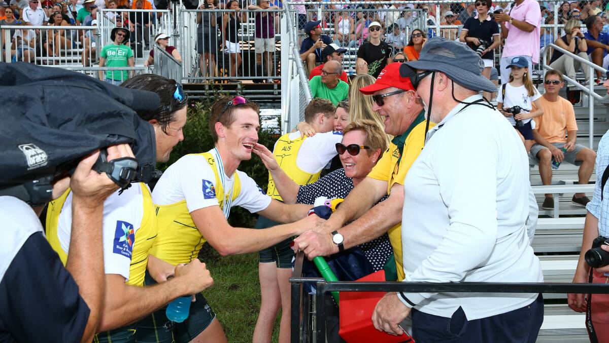 WINNERS ARE GRINNERS: Jack being congratulated by parents Jenny and Peter Hargreaves. Photo: ROWING AUSTRALIA.
