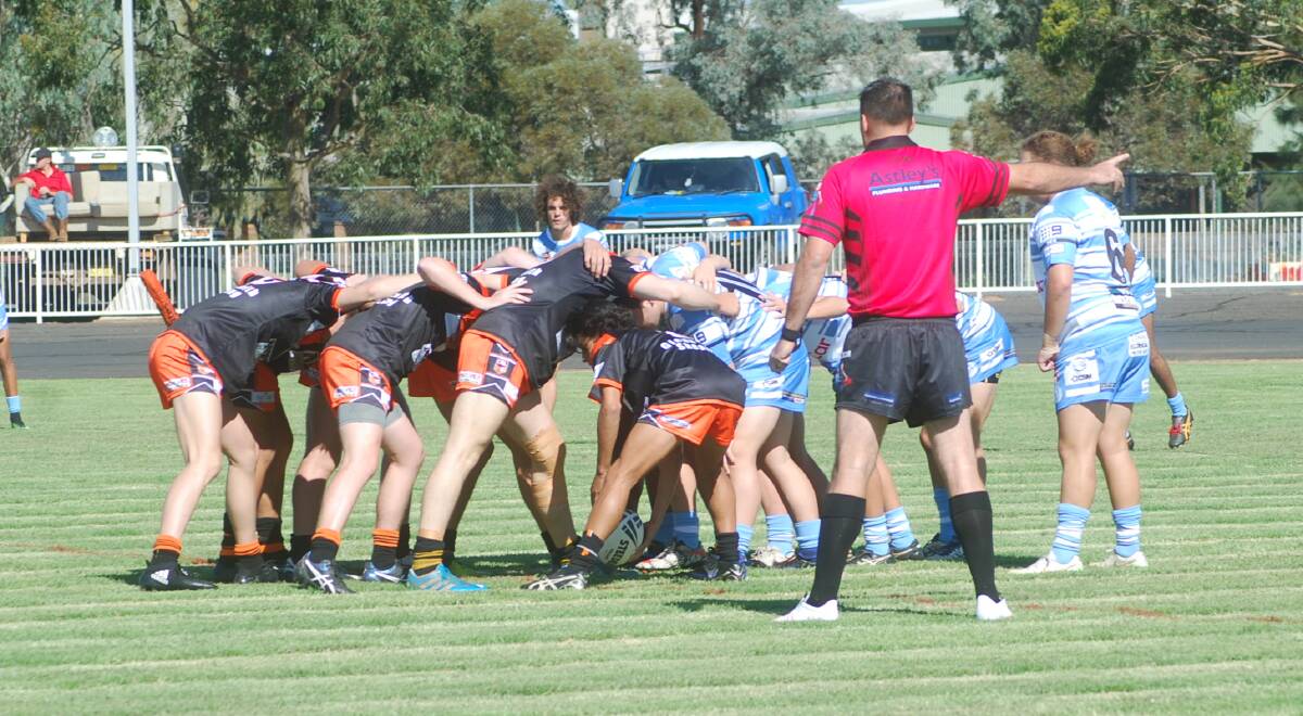 UNDER 18s TIGERS: A huge scrum by the junior boys. 