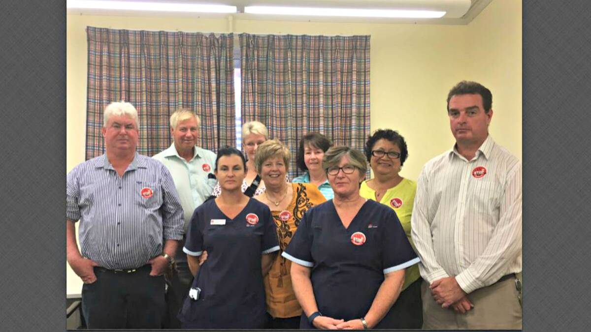 WORKING TOGETHER: Deputy Mayor Glen Neill, Mayor Ray Donald and Shire General Manager Derek Francis with nursing staff from the Multi-Purpose Centre. Photo: CONTRIBUTED.
