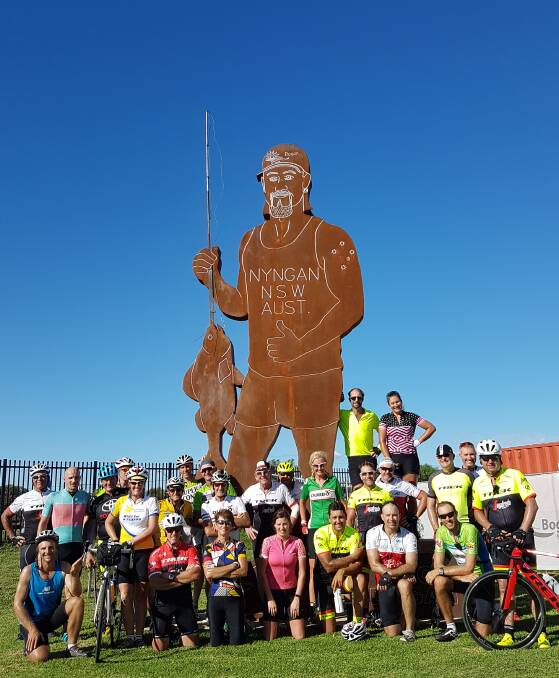 END OF DAY ONE: The Back O' Bourke Bike Riders meet the Big Bogan at the end of their first day when they rode from Dubbo to Nyngan. Photo: GRACE RYAN. 