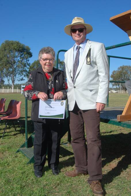 AWARDED: Show president Will Marr presents Nerida Wright with a life membership to the Show for her contributions to the Pavilion. Photo: GRACE RYAN.