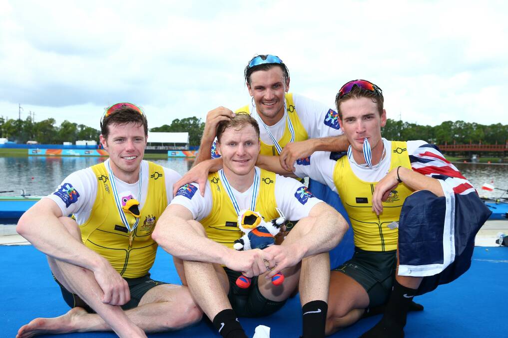 WORLD CHAMPIONS:  Joshua Hicks, Spencer Turrin, Alexander Hill and Jack Hargreaves after their medal ceremony. Photo: ROWING AUSTRALIA. 