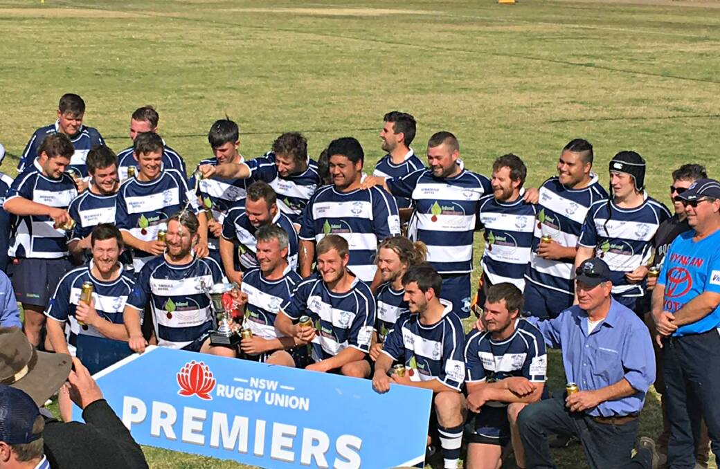 WINNERS ARE GRINNERS: An excited second grade side after winning the premiership on Saturday. Photo: BOGAN BULLS.