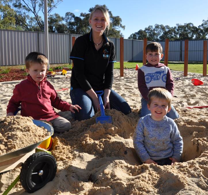 DIGGING: Patrick Fanning, instructor Ally Hooper, Luke McHattan and Louis Young having a great time in the sandpit. See more photos at nynganobserver.com.au