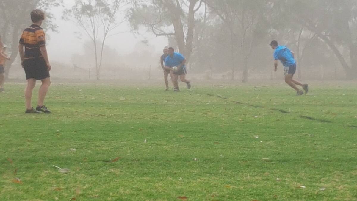 A dust storm on December 4 didn't upset touch players in Nyngan. Check out the pictures here.