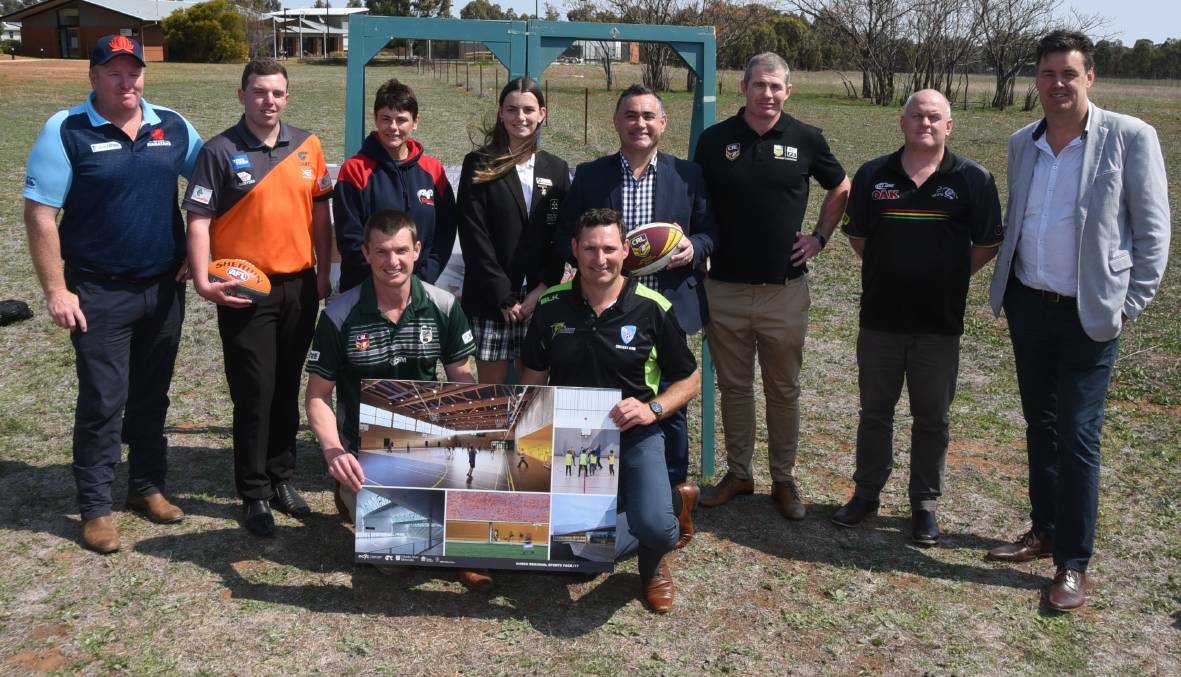 EXCITEMENT: Stakeholders from various sports and community groups with NSW deputy premier John Barilaro (fourth from right) at the proposed site on Tuesday. Photo: BELINDA SOOLE