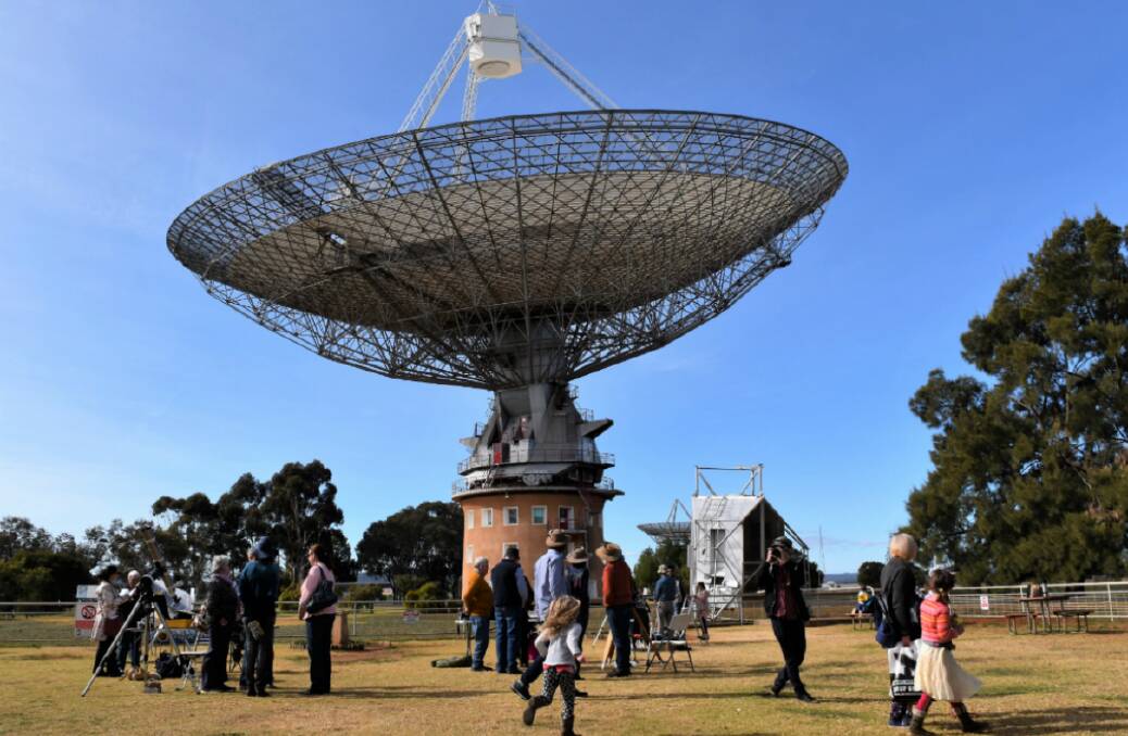 Look to the skies: A large crowd came to the Parkes Observatory Visitors Centre earlier this month for AstroFest celebrations. Photo: Contributed