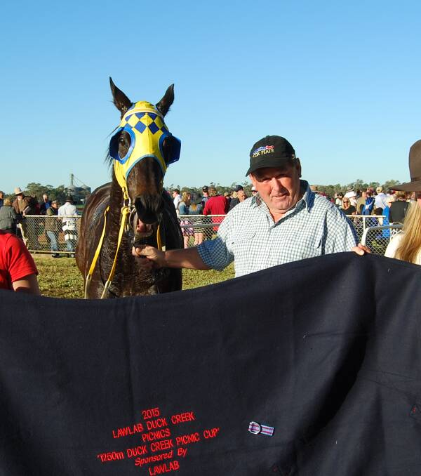 SUCCESS: Russell Green, pictured after a previous win at Nyngan, was rejoicing again at the track on Tuesday. Photo: NYNGAN OBSERVER