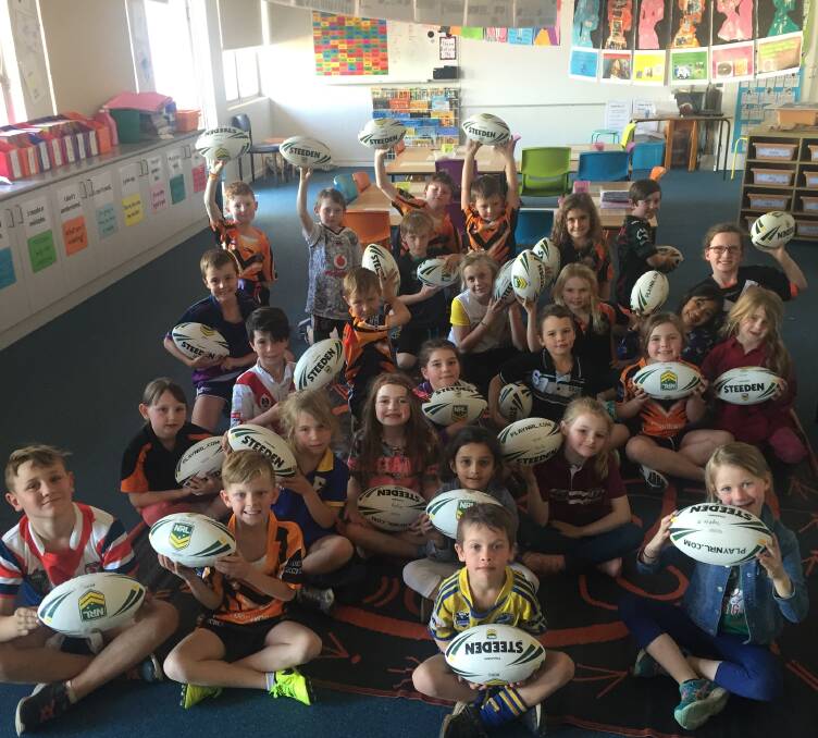 THAT'S MY TEAM: Footy colours day at St Joseph's Catholic School in the last week of term. Photo: CONTRIBUTED.