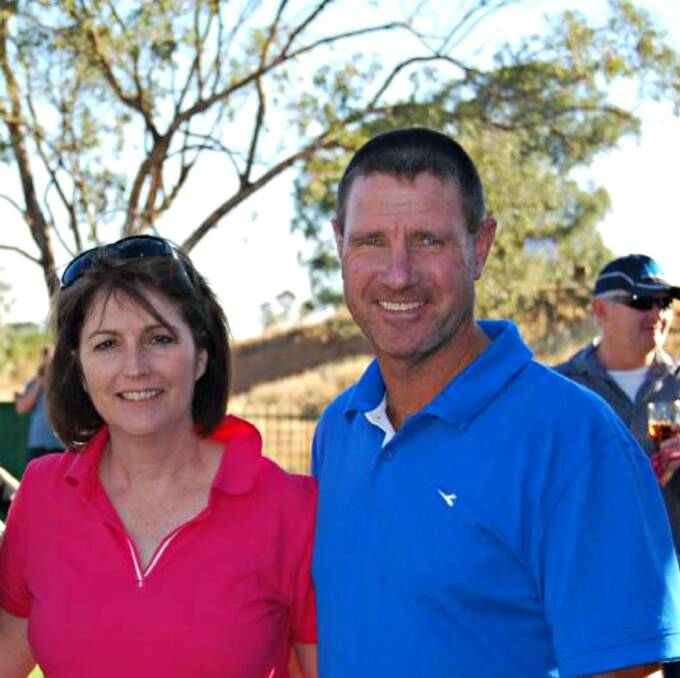 Mick Beetson was one of the five golfers who braved the heat to play on Saturday. He was the winner. Here he is with Sandra Beetson. Photo: FILE