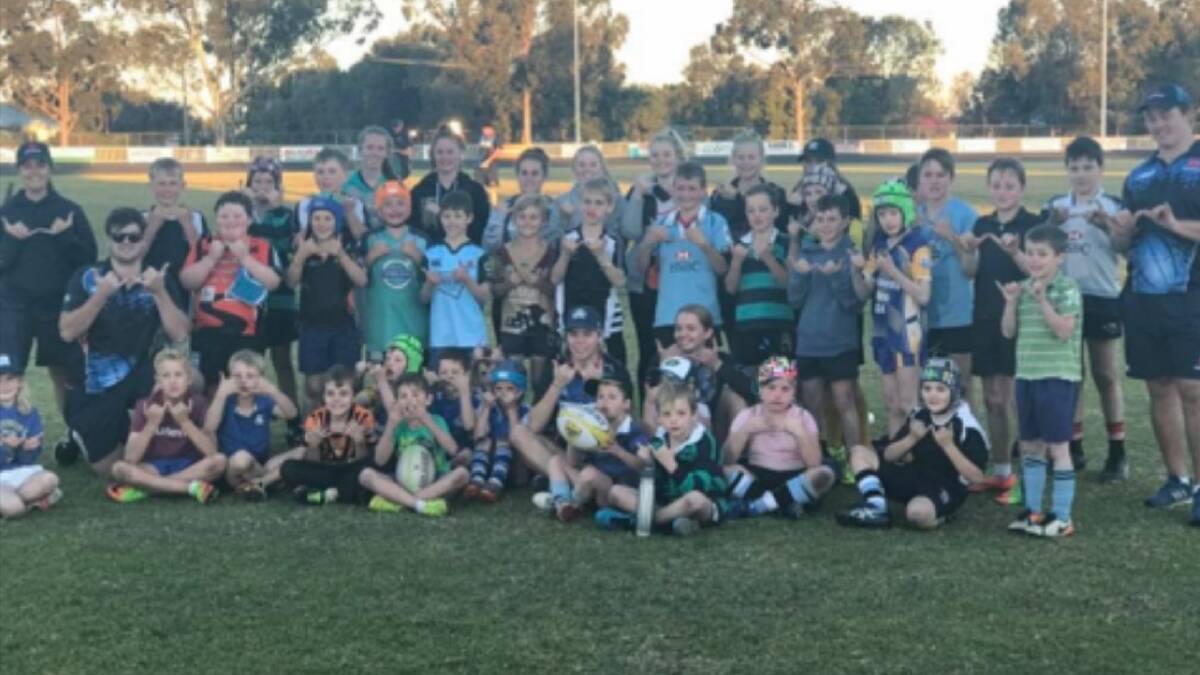 SERIOUS FUN: 40 kids took part in a NSW Rugby Union training camp at Larkin Oval on Friday. Photo: CONTRIBUTED