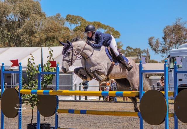 'ON FIRE': Maddie Harley on Maeve, the grey she has brought up with step-dad Dave Motley. Her win came on Jasper, another horse she trained herself. Photo: CONTRIBUTED