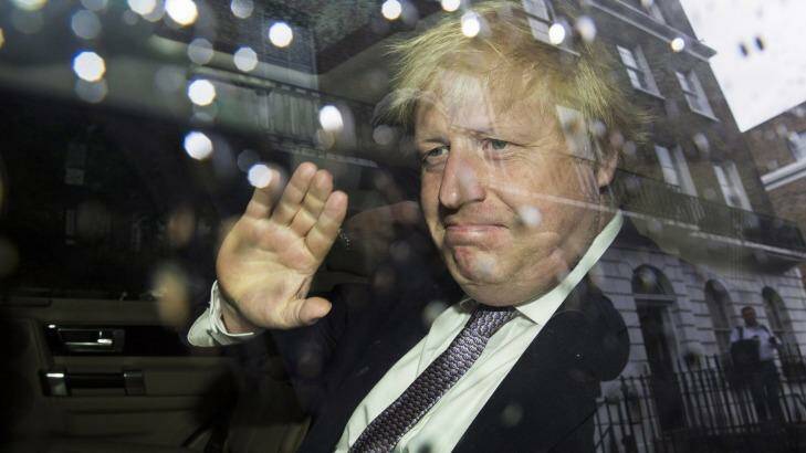 Former London mayor Boris Johnson waves as leaves his home by car on June 27 in London. Photo: Jack Taylor/Getty