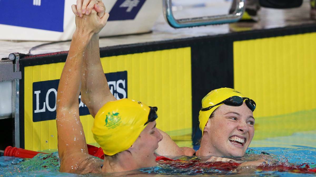 DAY FIVE: Cate Campbell (R) of Australia celebrates winning the gold medal with silver medallist Bronte Campbell of Australia after the Women's 100m Freestyle Final. PICTURE: GETTY