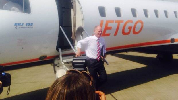 Premier Campbell Newman arrives in Cairns during the campaign. Photo: Kim Stephens