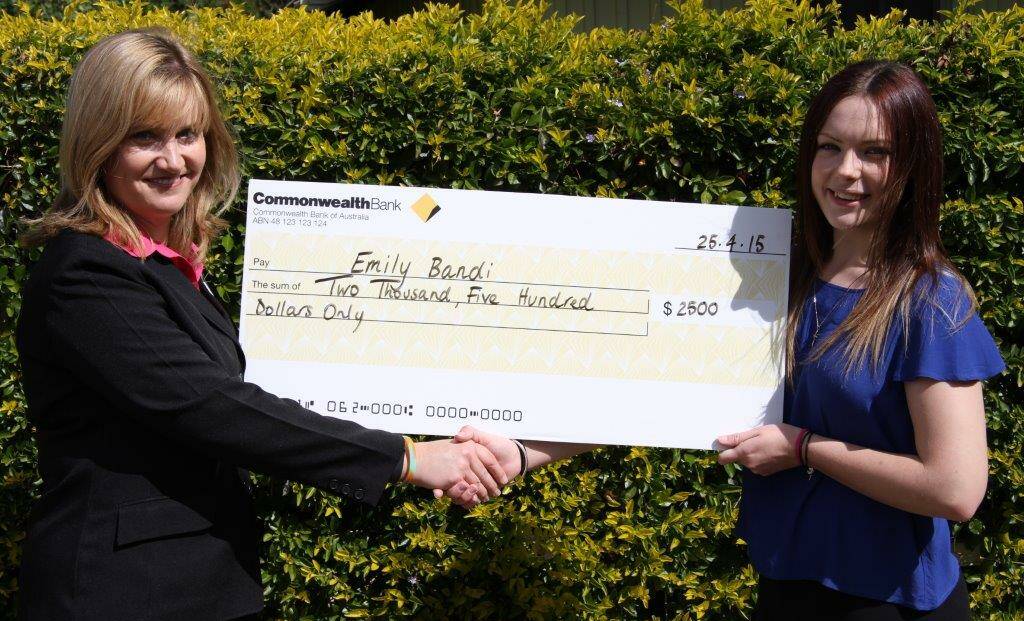 o Chairperson Nyngan CEF Nicole Hunt  presenting a cheque to Emily Bandi, the first recipient of the CEF Ag Expo’s Education Grants. 