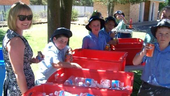 o St Joseph’s SRC with Mrs Moody serving icy cold drinks.