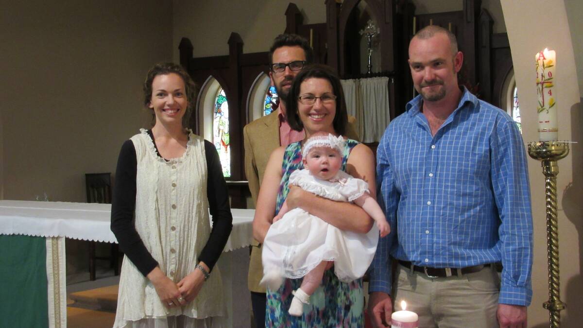 Jererd Pearce and Catherine McDonald and little daughter Lucy Elizabeth christened and godparents Roxanne Pearce and Michael McDonald