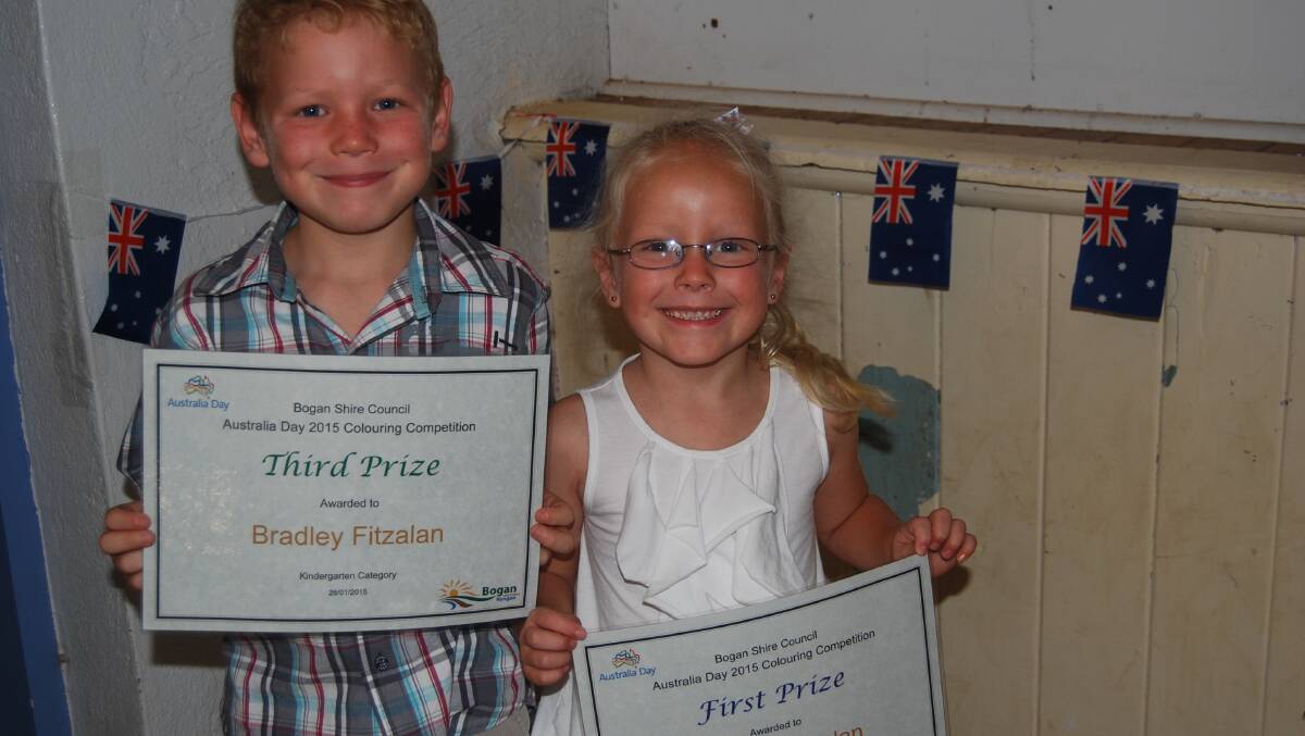 Bradley and Chelsey Fitzalan showing off their colouring-in prizes at the Australia Day presentations.