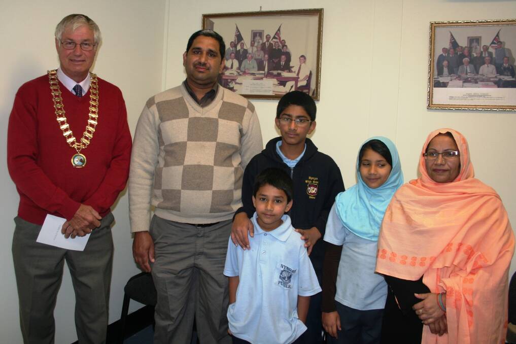 o Mayor Ray Donald pictured with Mr Muhammad Tariq, Faras, Fariha, Shaeel and Mrs Tariq. Mr Tariq and the three children became Australian citizens on 23 May 2013. Congratulations to the family.