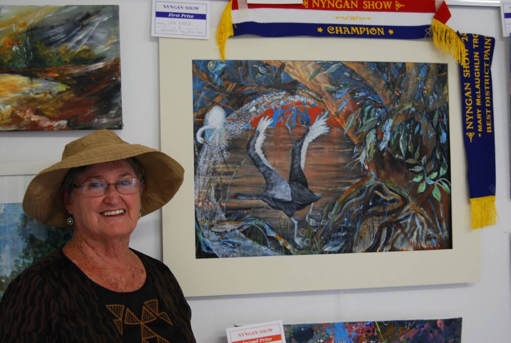 o Local artist Lynn Hodge with her beautiful painting titled ‘Tree of Life’ - subject Darling River. Lynne was awarded ‘Champion of the Show’ for this masterpiece.