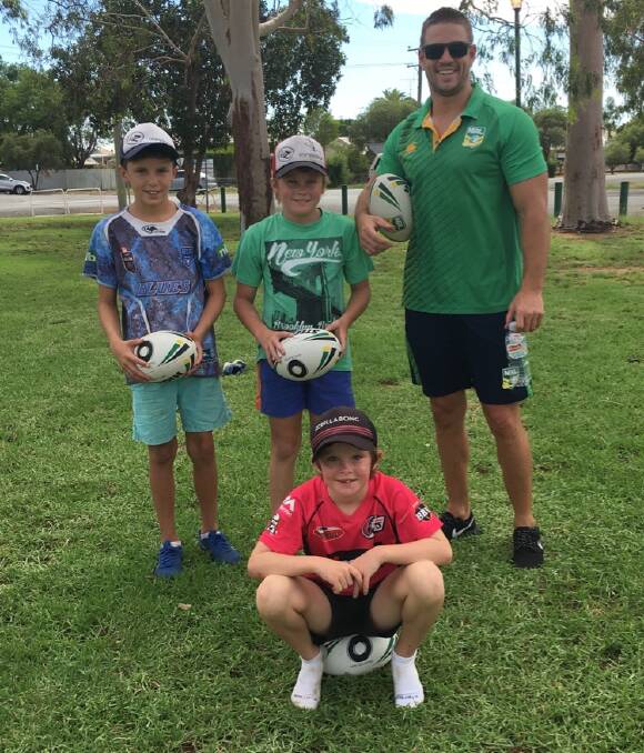 GAMES GALORE: Byron Warren (NRL), Archie, Will and Cooper had some fun with the football last week. Photo: CONTRIBUTED.