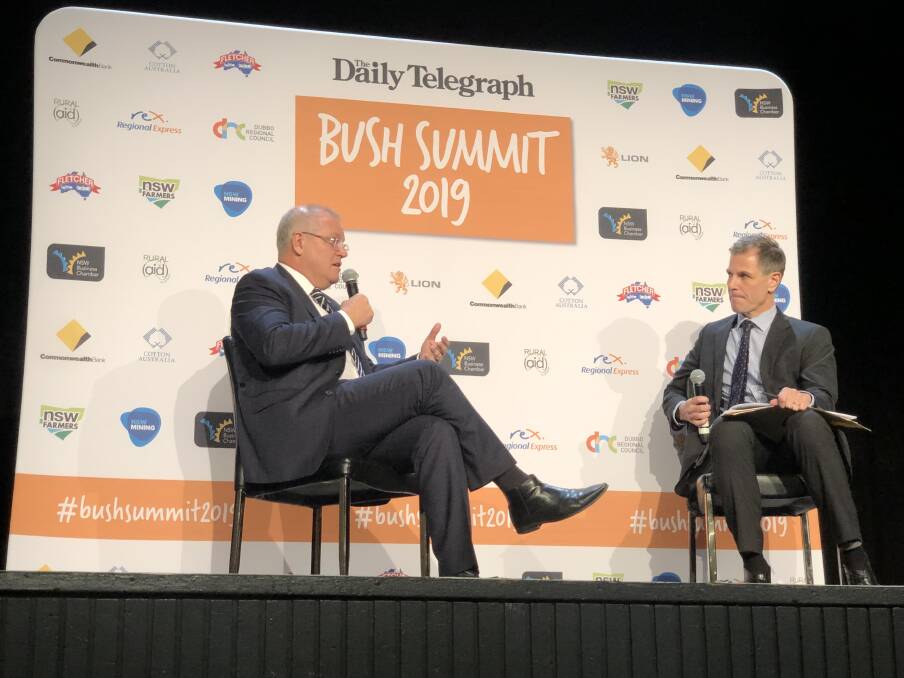 ANSWERING QUESTIONS: Prime Minister Scott Morrison answers questions from the audience in a Bush Summit session moderated by Ben English. Photo: BELINDA SOOLE