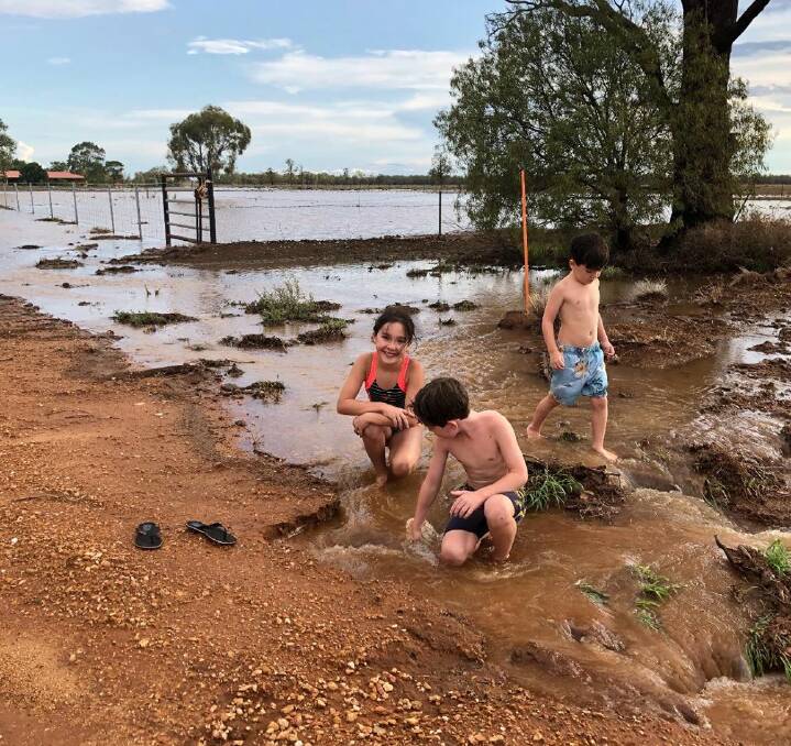 FUN: Lilly, Charles and Edward Robb play in the mud. Photo: HOLLY ROBB