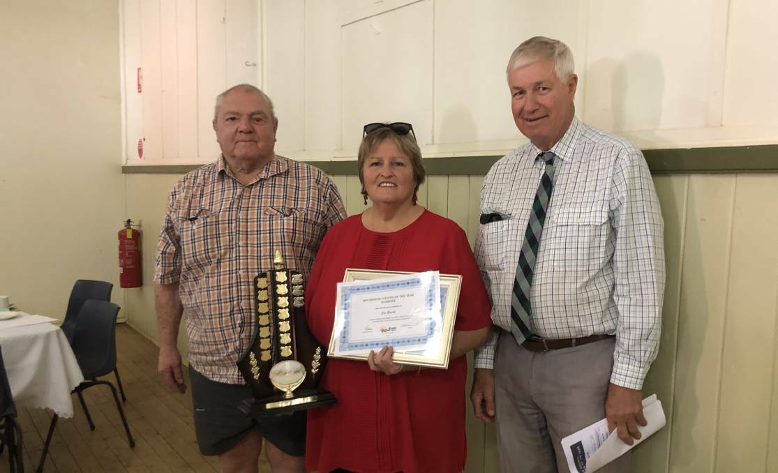 2019 Senior Citizen of the Year Sue Bourke with Tommy Ryan and Bogan Shire Mayor Ray Donald. Photo: ZAARKACHA MARLAN
