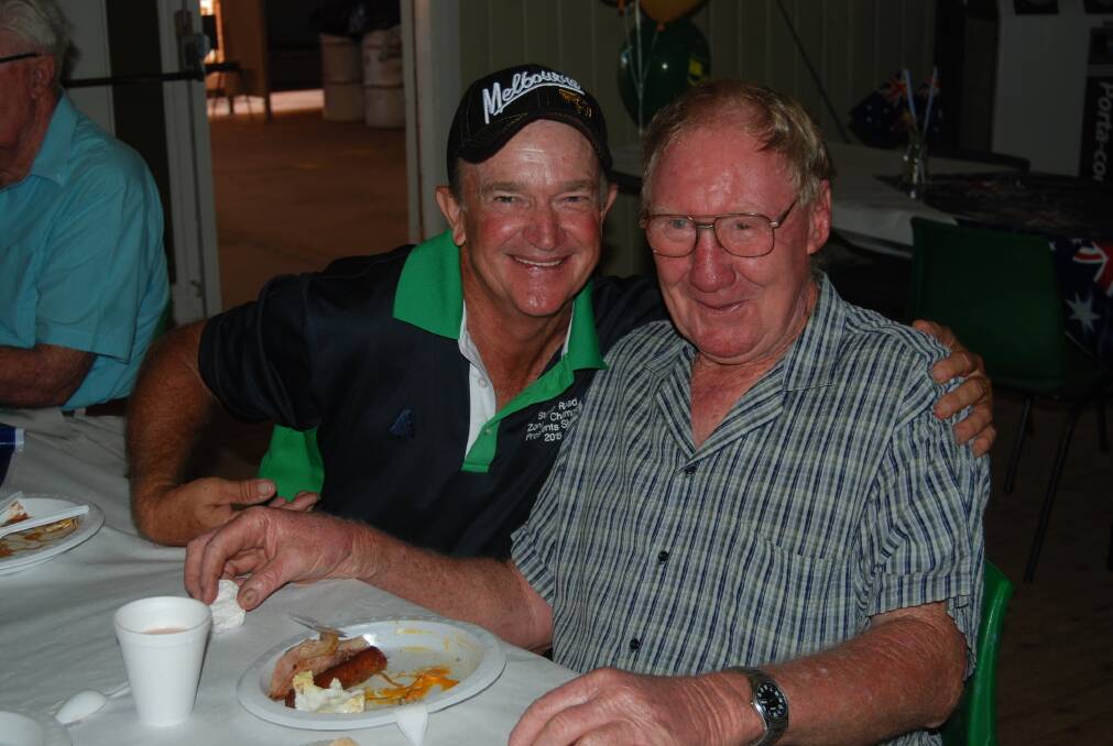 Steve Read and Bob Sainsbury enjoying the Australia Day barbecue breakfast.