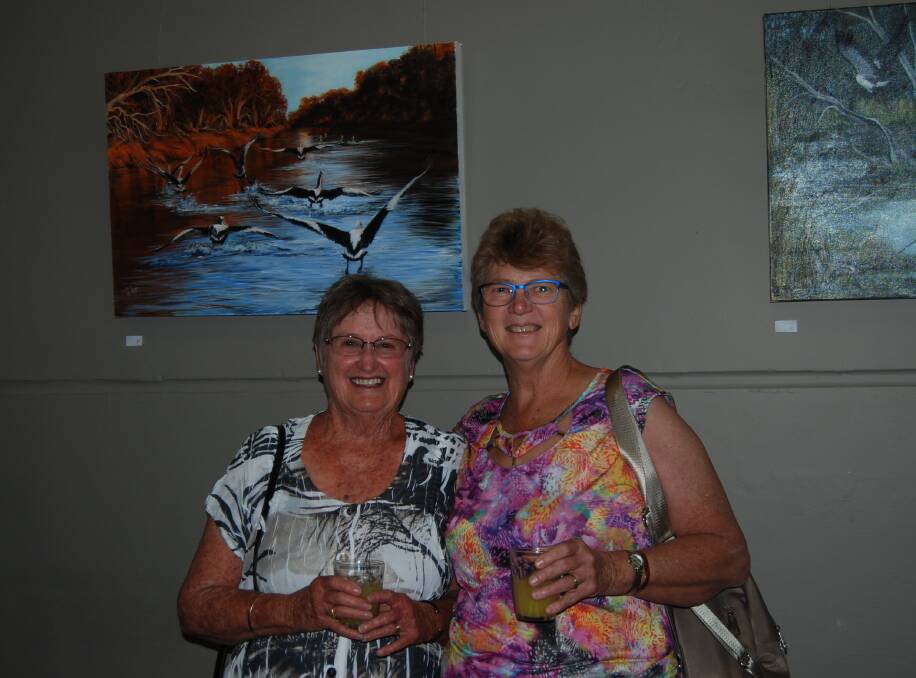 OUR PLACES: Nyngan's Lynn Hodge and Lyn Quinton at the opening of their exhibition in Dubbo last Saturday. Photo: ZAARKACHA MARLAN