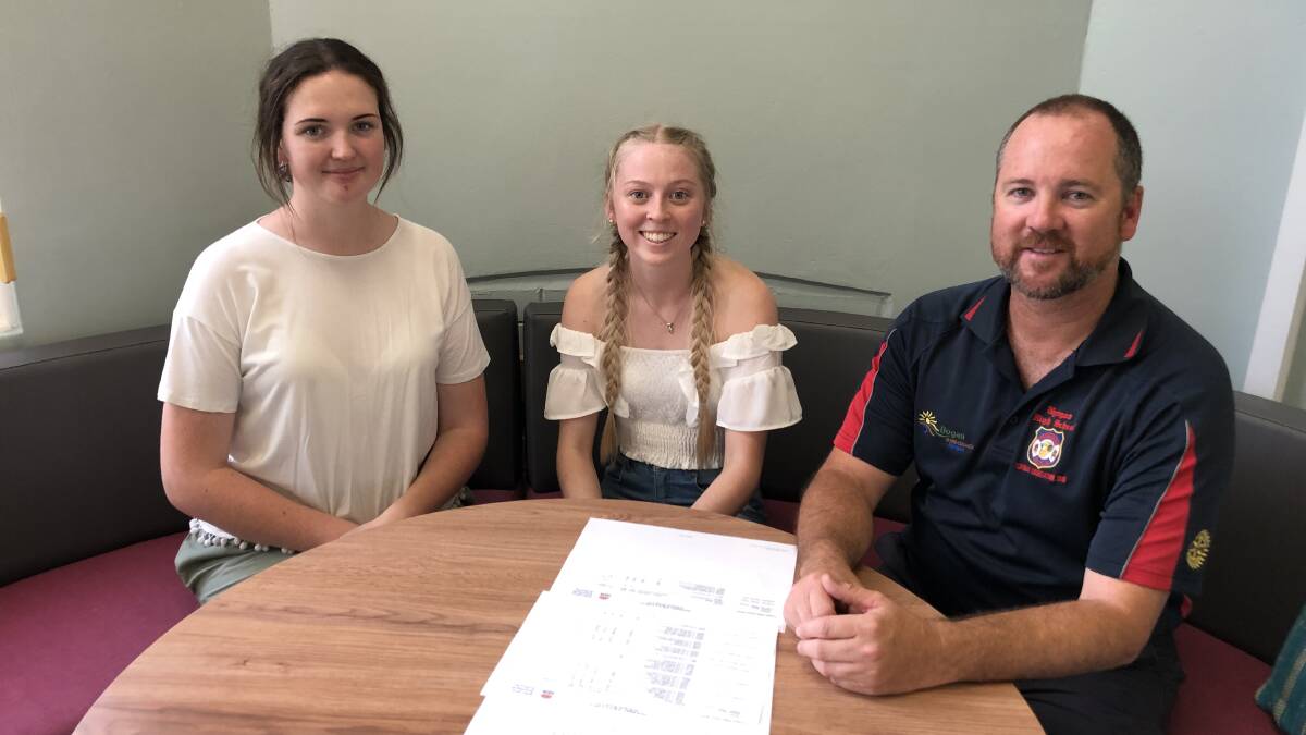 Principal Michel Gibson (right) with students Chloe Vernon and Rahni Bodanski reflecting on their great overall results. Photo: CONTRIBUTED