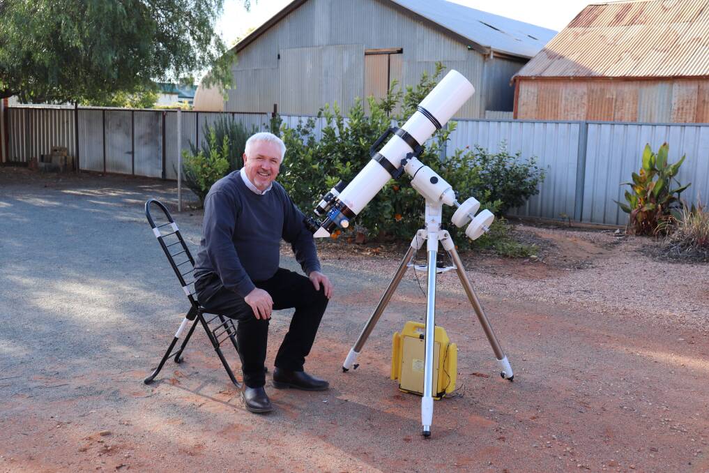 UP HIGH: Also a member of the Central West Astronomical Society, Father Paul Clark will be on hand to answer questions about the night sky. Photo: ZAARKACHA MARLAN