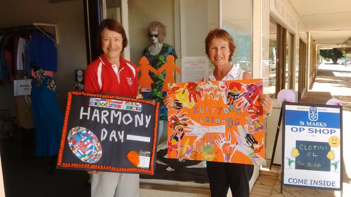 HARMONY: Dorothy Inglis from St Mark’s Op Shop with local Ability Linker Wendy Beetson help to spread the message of Harmony Day. Photo: CONTRIBUTED