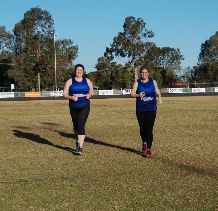 TEAM TOBY: Grace Ryan and Margot Downing prepare for the 14 kilometre track. Photo: ZAARKACHA MARLAN
