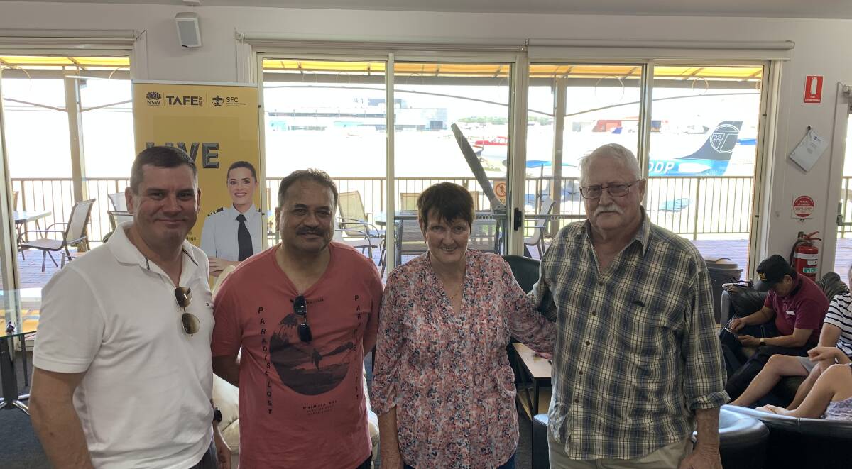 Pilot Brad Warner with 'earth Angel' Graeme, Helen and Arthur Rose at the Sydney Flying Club just after arriving at Bankstown airport. Photo: CONTRIBUTED