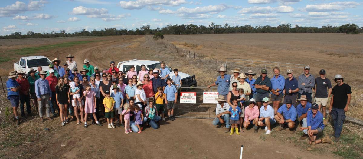 FARMING THREATNED: Some of the people protesting against a proposal to build a gas pipeline to service Santos coal seam gas wells near Narrabri line up for a photograph near Coonamble. Photo: SUPPLIED