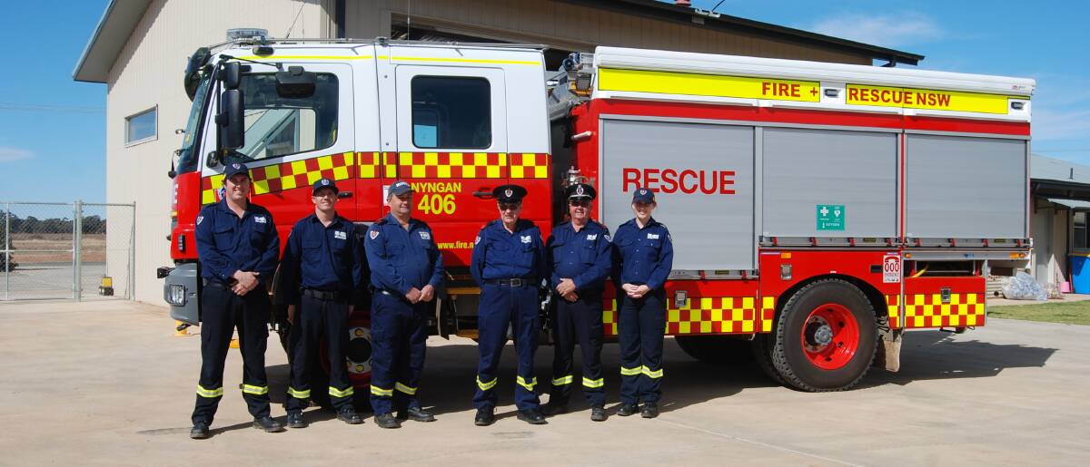 RETIREMENT: Collin Pardy (fourth, left) has hung up his jacket for the last time at the Nyngan Fire and Rescue Station 406. Photo: ZAARKACHA MARLAN
