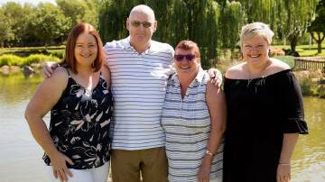 Lionel McGuire (middle) with daughter Carin McGuire, wife Denise McGuire and daughter Sally Everett. Picture: Supplied