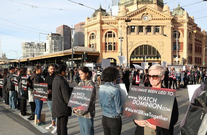 Animal rights' protesters blocked the intersections of Flinders and Swanston Streets in Melbourne. 