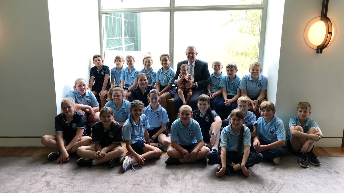 Learning the ropes: A group of year five and six students from Nyngan Public School with federal MP Mark Coulton. Photo: Contributed