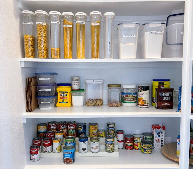 TIDY: Group items that are similar in your pantry. Photo: Shutterstock.