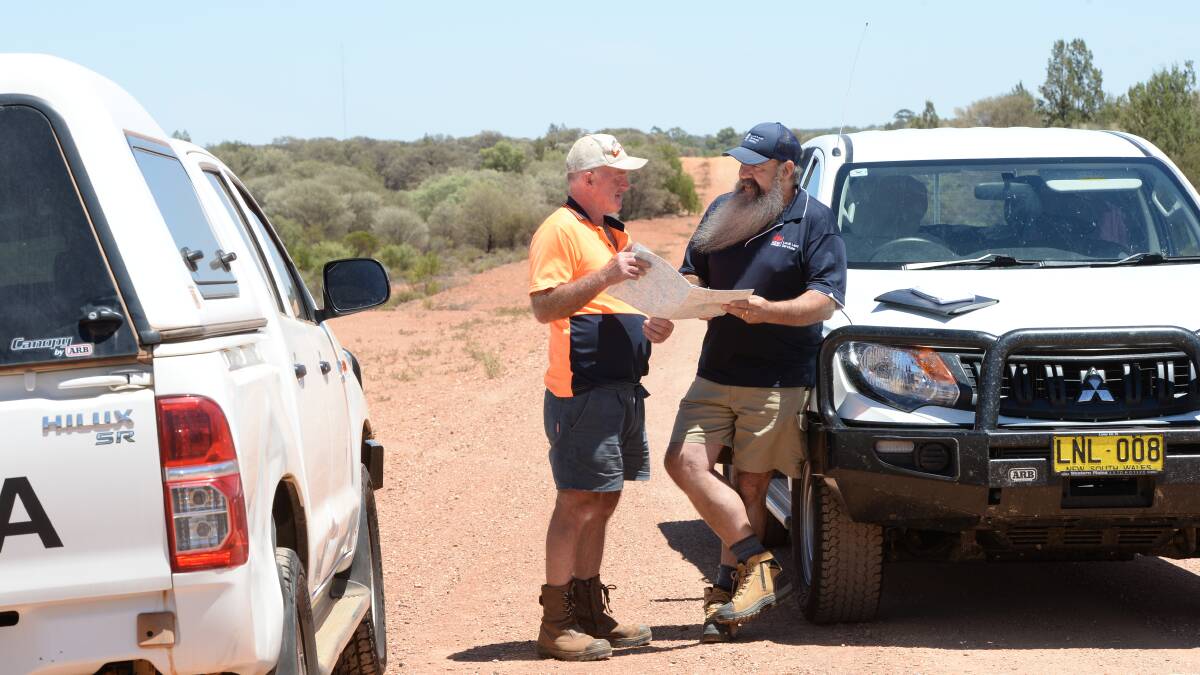Nymagee farmer, Richard Deighton, "Coree", talks with Brian Dohnt, senior land services officer from the Local Land Services office in Cobar. The LLS is helping  farmers tackle Devil's Rope cactus weed.  