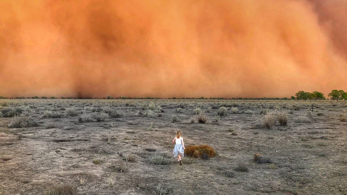 Just seven weeks ago, Marcia McMiIllan took this picture of her daughter running into a dust storm at Mullengudgery. The picture went viral and appeared in many news sites around the world.