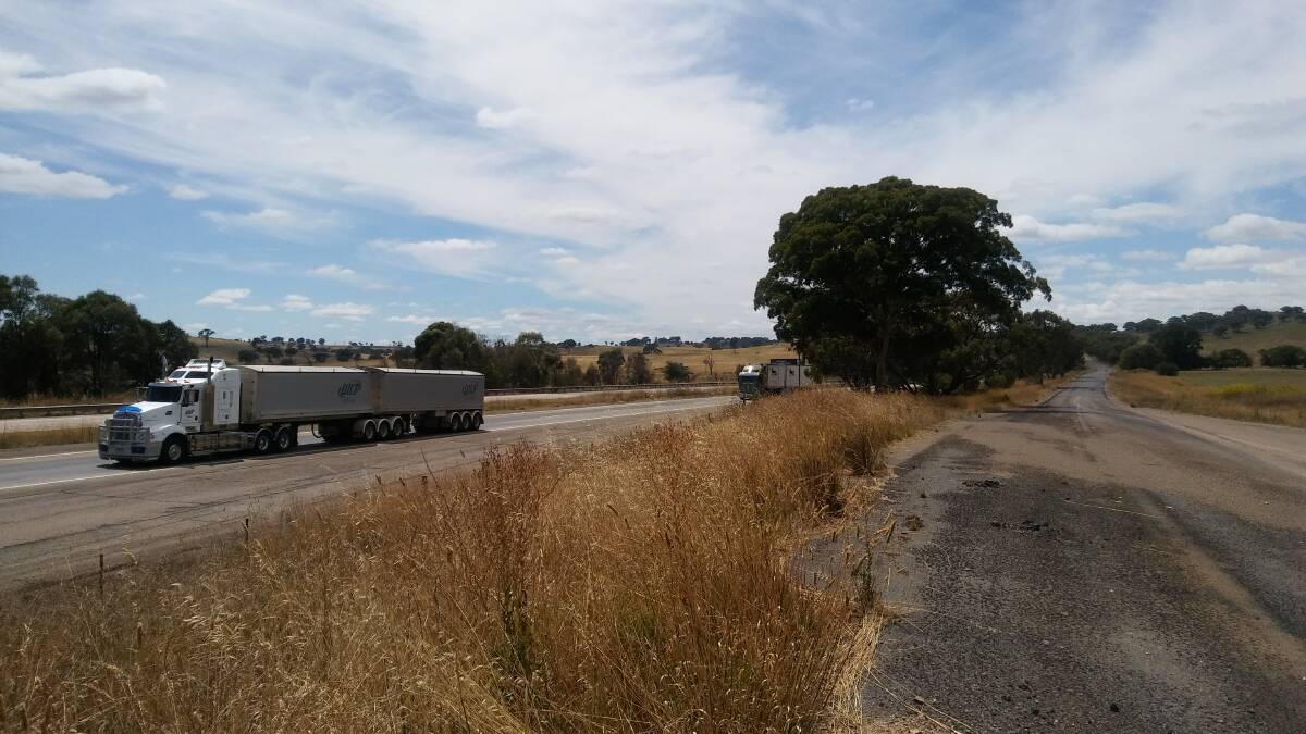 One example of an old highway (right) being retained as a local service road. Photos: Sam Hollier.