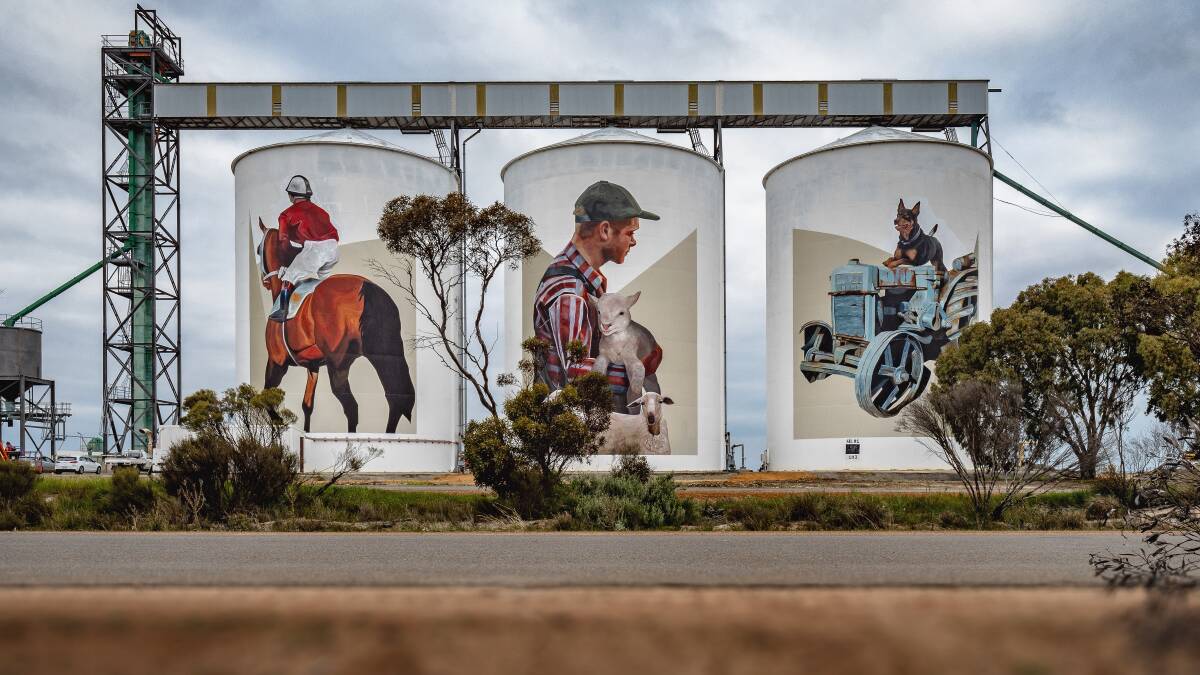 RIDING HIGH: Miami-based artist Evoca1's depiction of Pingrup says it all. A jockey on a horse, a lamb in a man's arms and a dog on a tractor. Photo: Bewley Shaylor/FORM.