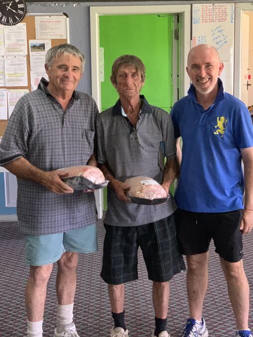 Winner of Robb's Butchery Pork Pairs Ron Smith and Paul Walsh presented by bowls President Mick Walsh.