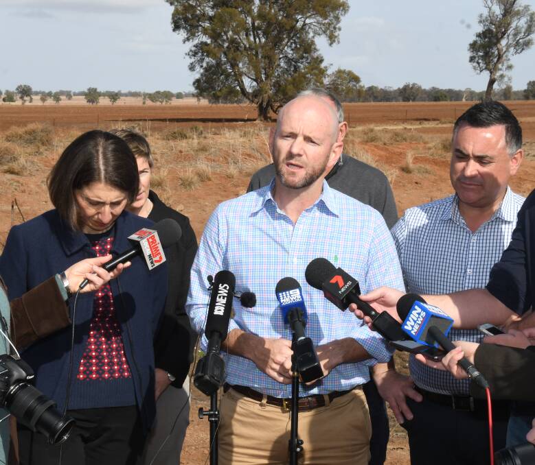 FUNDS STILL FLOWING: Primary Industries Minister Niall Blair announced state government measures at a property north of Dubbo in June. Photo: BELINDA SOOLE