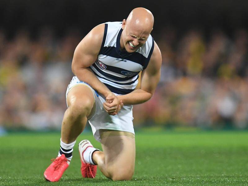 Geelong's Gary Ablett suffered a shoulder injury early in the AFL grand final against Richmond.